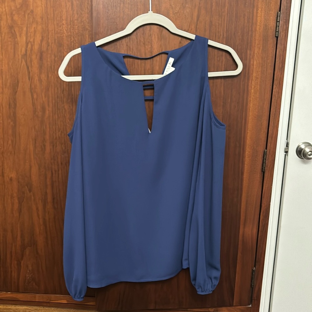 Women’s cold shoulder blouse in a bluish purple